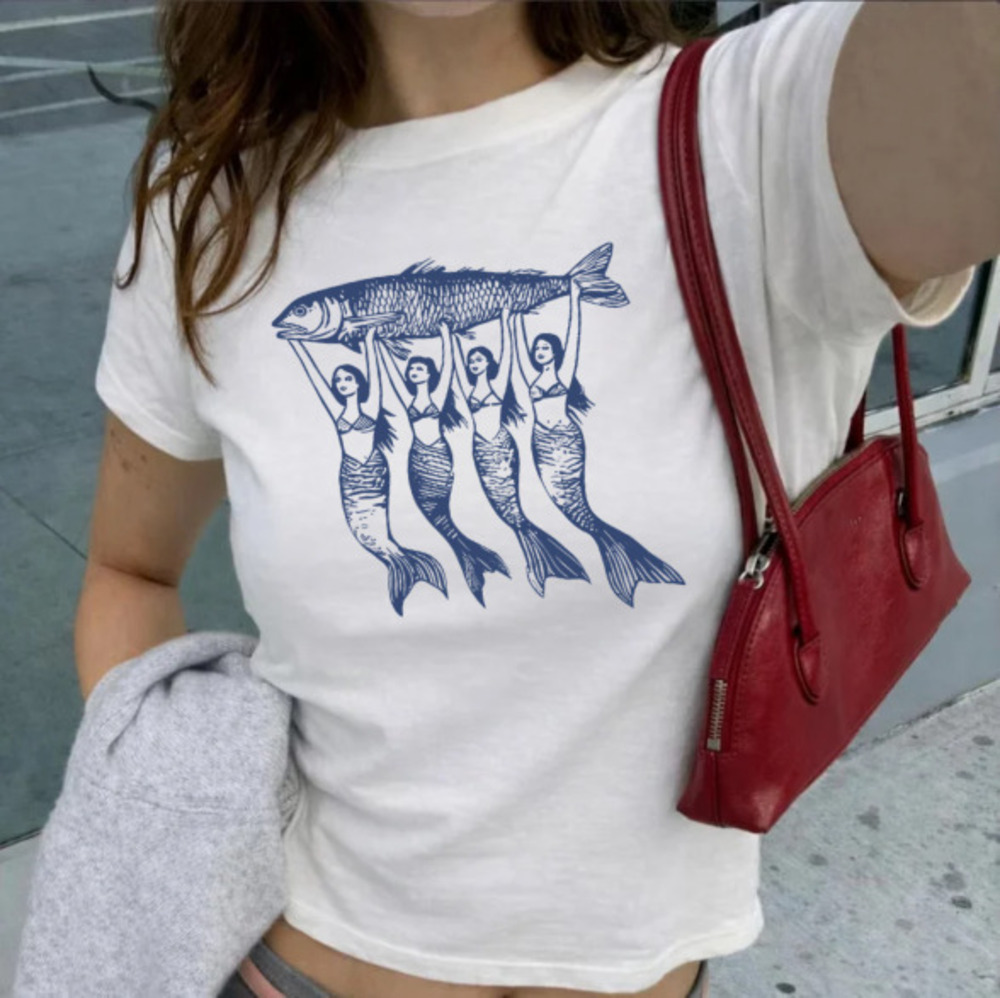 Four Mermaids Holding Giant Fish Blue Print Vintage Baby Tee